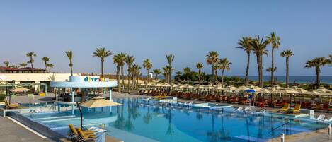 Indoor pool, 2 outdoor pools, pool loungers, lifeguards on site