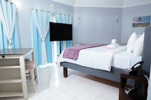 Quarto executivo, 1 cama King, ar-condicionado, vista para o mar | Roupas de cama antialérgicas