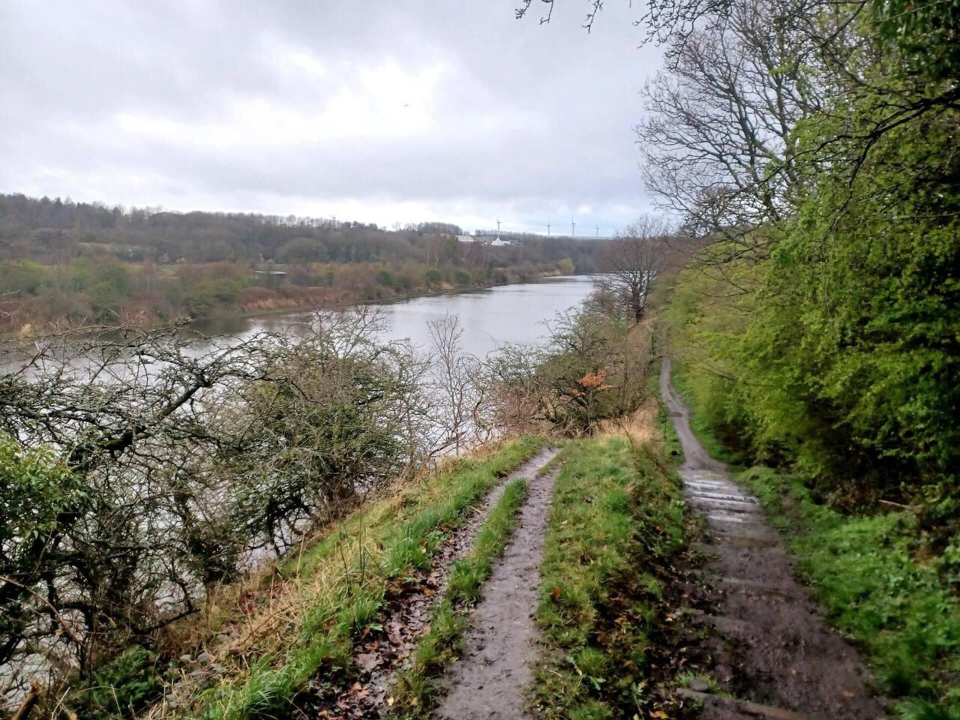 A river with a path alongside it.