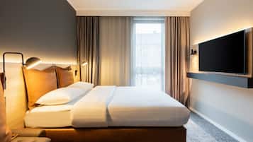 Familienzimmer, 1 Queen-Bett und Schlafsofa | Schreibtisch, laptopgeeigneter Arbeitsplatz, VerdunkelungsvorhÀnge