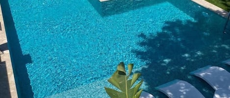 Seasonal outdoor pool, sun loungers, lifeguards on site