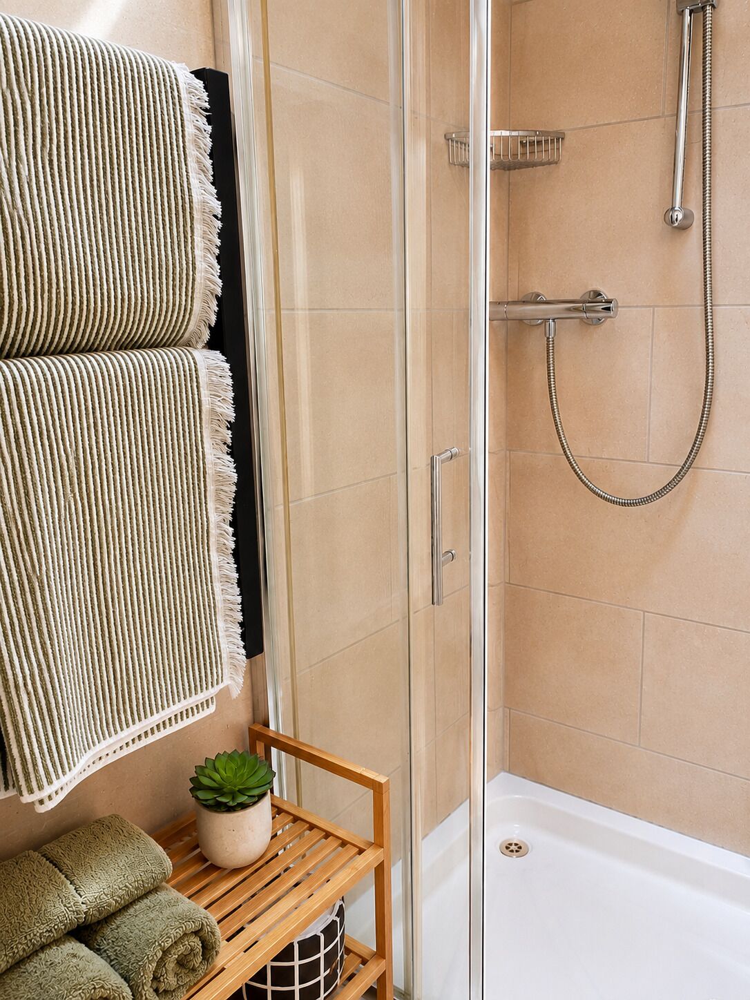 Shower, hair dryer, bathrobes, towels