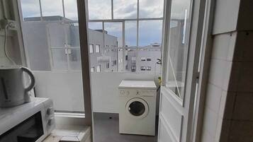 Fridge, microwave, toaster oven, cookware/dishes/utensils