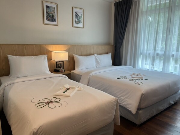 Familien-Dreibettzimmer | Allergikerbettwaren, Zimmersafe, Bügeleisen/Bügelbrett, kostenloses WLAN