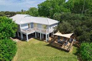 Enjoy the serene surroundings from the expansive balcony area.