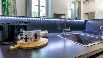 Apartamento | Cocina privada | Frigorífico, horno, placa de cocina y lavavajillas