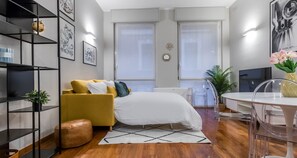 Apartment | Living area | 45-inch Smart TV with cable channels, TV - JOIVY Elegant 1 Br Apt In Front Of The Sforzesco Castle (Milan)