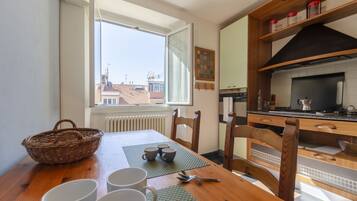 Apartment | Private kitchen | Fridge, cookware/dishes/utensils, dining tables