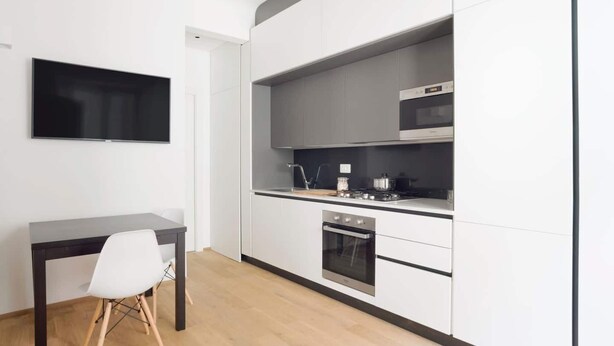 Living area - JOIVY Bright Apt Near The Train And Bus Station (Genoa)