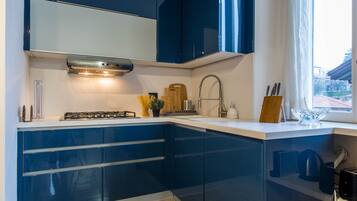 Executive Apartment, 2 Bedrooms | Private kitchen | Mini-fridge, microwave, oven, stovetop