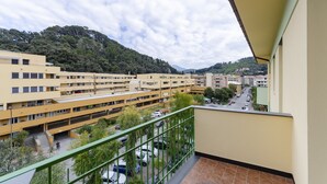 A residential building complex with multiple floors and balconies. - JOIVY Family Flat W/Terrace & Parking Near Beach (Sestri Levante)