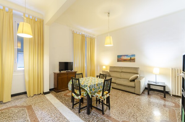 Apartment | Living area | 32-inch flat-screen TV with cable channels, TV - JOIVY Spacious 1-Br Flat In The Centre Of Genoa (Genoa)