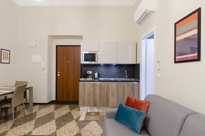 Apartment | Living area | 20-inch flat-screen TV with cable channels, TV - JOIVY Modern Flat In The Perfect Centre Of Genoa (Genoa)