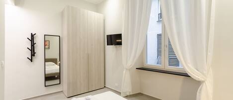 2 bedrooms, laptop workspace, blackout curtains, iron/ironing board