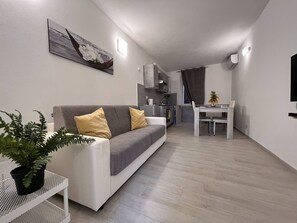 Appartement, 1 chambre | Coin séjour