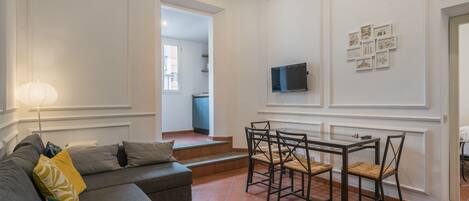 Apartment | Living area | 25-inch Smart TV with cable channels, TV