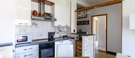 Appartement | Cuisine privée | CafétiÚre à espresso, cafetiÚre-théiÚre, bouilloire électrique