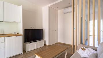 Apartment | Private kitchen | Espresso maker, dining tables