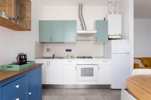 Appartamento | Cucina privata | Tavolo da pranzo