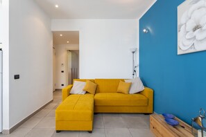 Apartment | Living area | 32-inch flat-screen TV with cable channels, TV