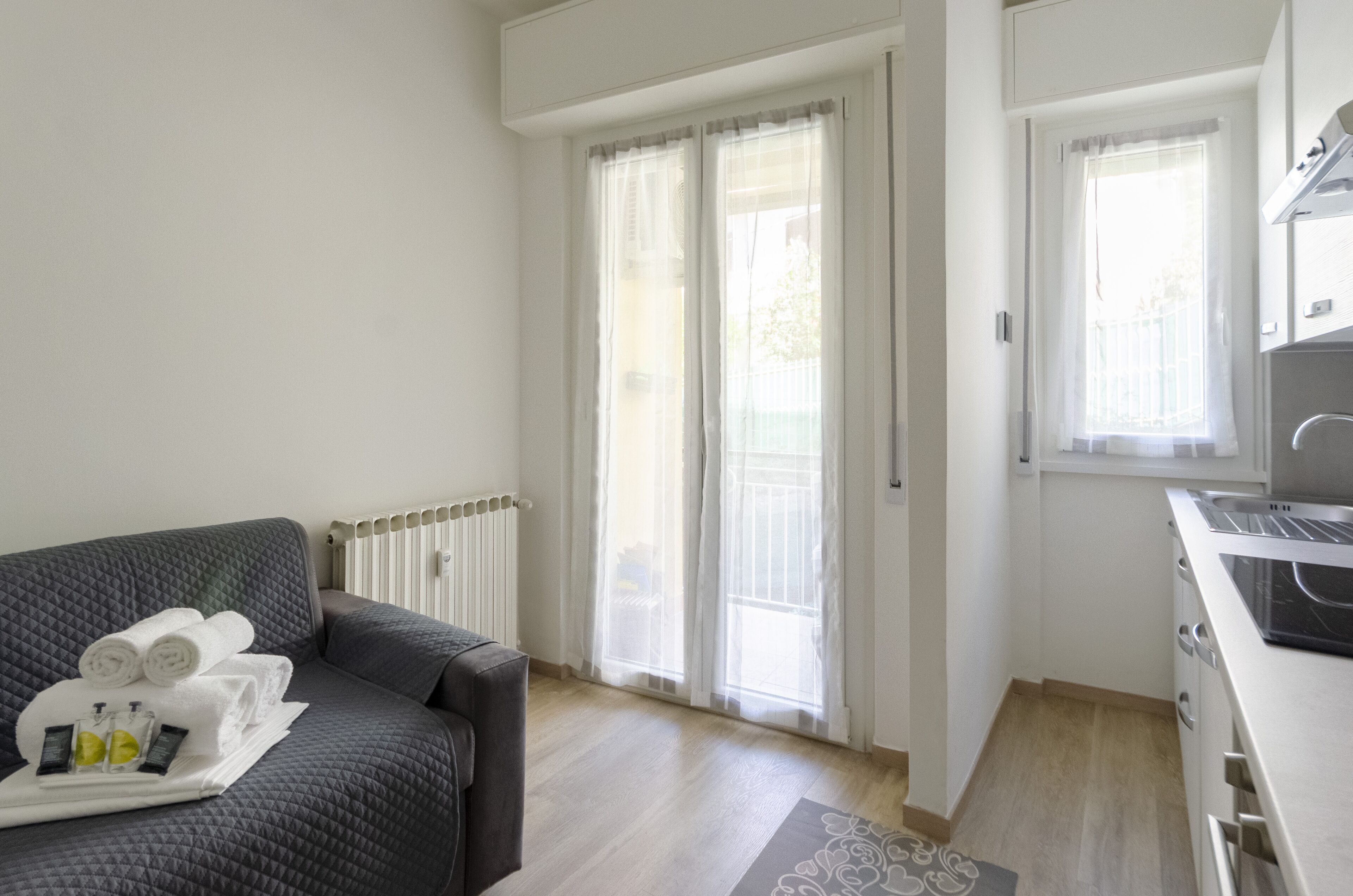 Appartamento | Area soggiorno | TV a schermo piatto 32 pollici con canali via cavo, TV