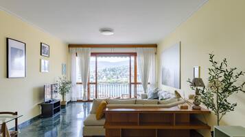 Apartment | Living area | 32-inch flat-screen TV with cable channels, TV