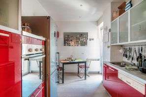 Apartment, 1 Bedroom, Balcony, Mountain View | Private kitchen | Full-size fridge, oven, stovetop, dishwasher - JOIVY Stylish Suite 52 (Como)