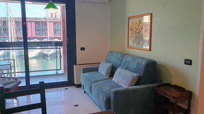 Apartment | Living area | 32-inch flat-screen TV with cable channels, TV - JOIVY Oreste’S Apartment (Genoa)