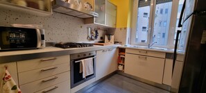 Appartamento | Cucina privata | Tavolo da pranzo