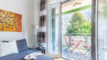 Appartement | Coin séjour | TV connectée de 30 pouces avec chaßnes par cùble, télévision