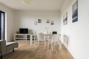 Apartment, City View | In-room dining - JOIVY Uptown Apartments (Milan)