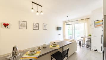 Apartment | Living area | 20-inch flat-screen TV with cable channels, TV