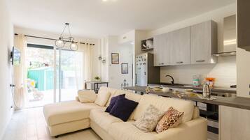 Apartment | Living area | 20-inch flat-screen TV with cable channels, TV