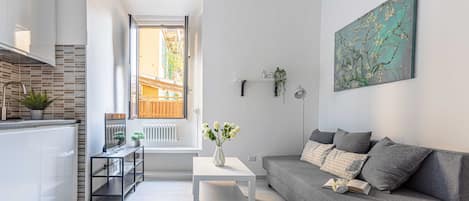 Deluxe Apartment | Living area | Smart TV