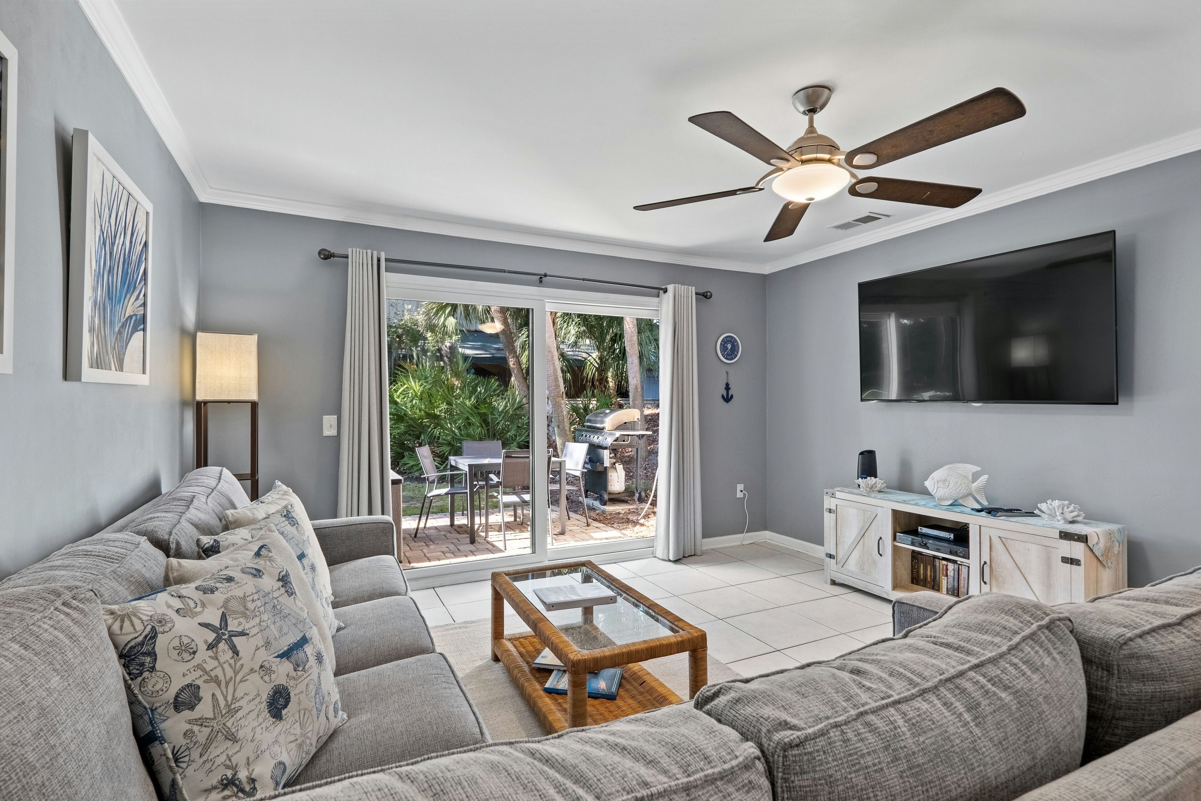 Dog-friendly villa with pool, beach access, patio, central AC, & washer/dryer