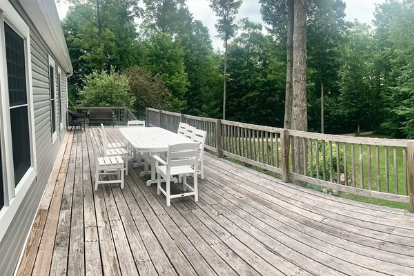 Expansive front deck, overlooking large private yard