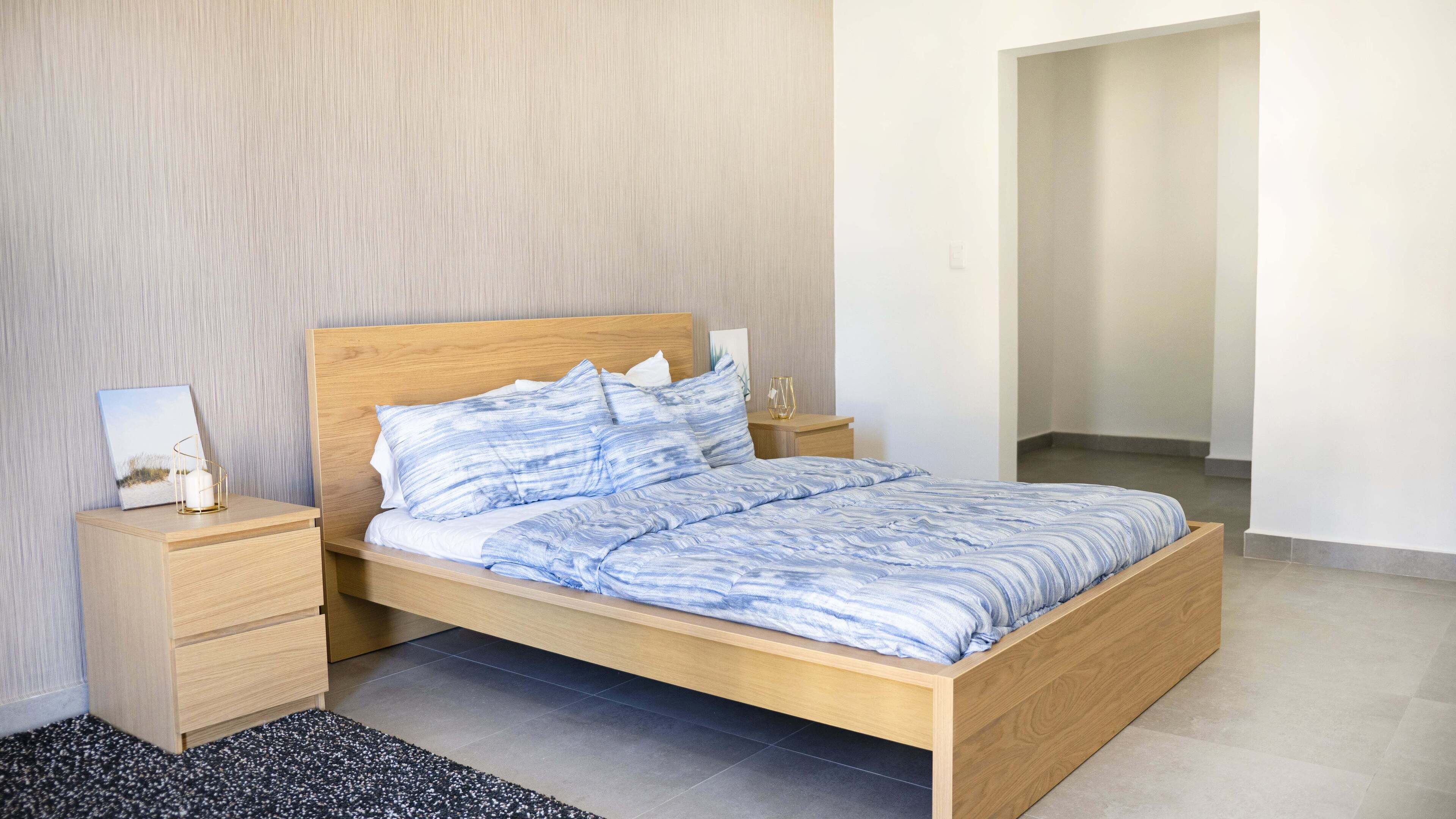 basic suite | bathroom | shower, rainfall showerhead, hair dryer, towels