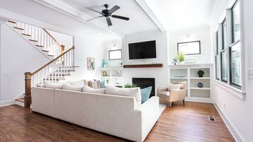 Smart TV, fireplace, books, music library