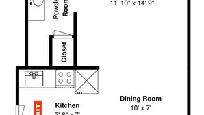 A floor plan of a house with a living room, dining room, kitchen, powder room, and bathroom. - Buried Treasure by Silver Sands Vacation Rentals (Port Aransas)
