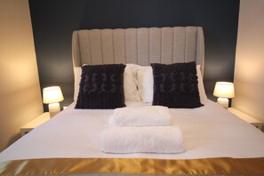 2 bedrooms, desk, blackout curtains, iron/ironing board