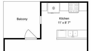 A floor plan with a balcony, kitchen, family room, bedroom, half bath, closet, and bath. - Fin And Tonic by Silver Sands Vacation Rentals (Port Aransas)