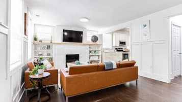 Smart TV, fireplace, books
