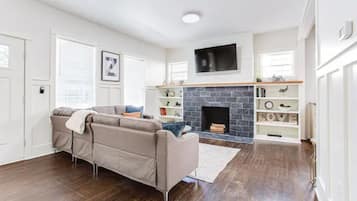 Smart TV, fireplace, books