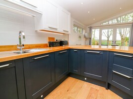 Fridge, dishwasher, cookware/dishes/utensils