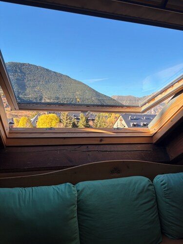 Triplex Erta 8 with sloping ceilings and excellent views