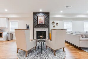 Smart TV, fireplace, books