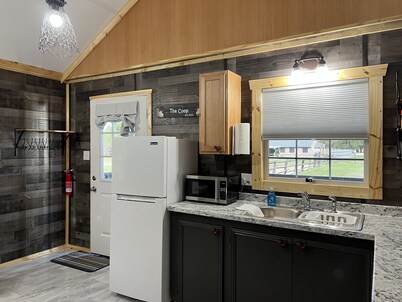 The Coop.  A lil taste of country with horses and chickens.