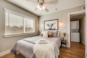 1 bedroom, desk, iron/ironing board, travel crib