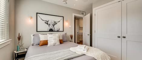 1 bedroom, desk, iron/ironing board, travel cot