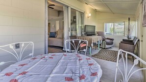 A cozy room with a bed, a table, and a television. - ~ 9 Mi to Universal: Orlando Retreat w/ Sun Porch! (Orlando)